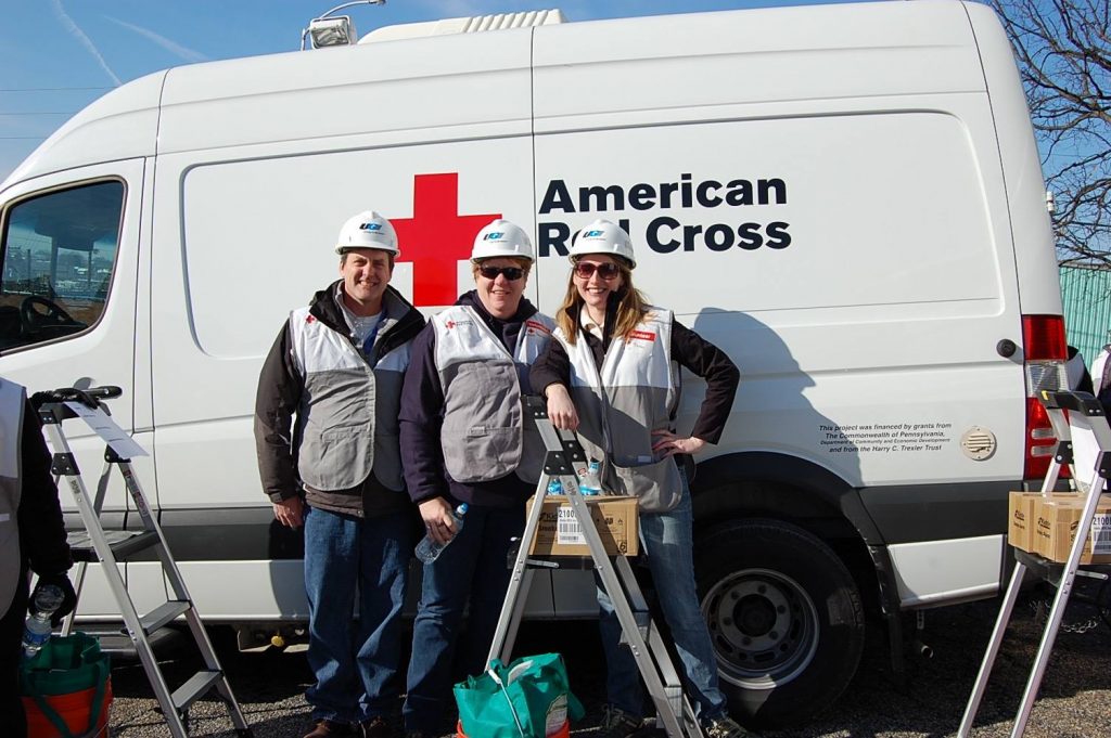 UGI employees pose in front of American Red Cross truck