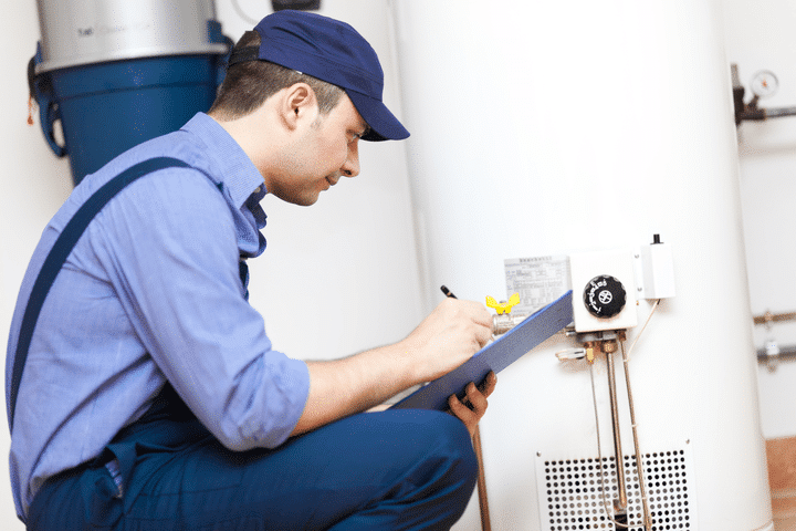 HVAC contractor fixing a furnace
