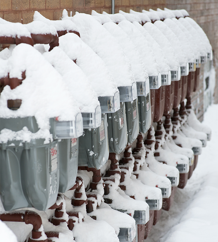 snow covered gas meters