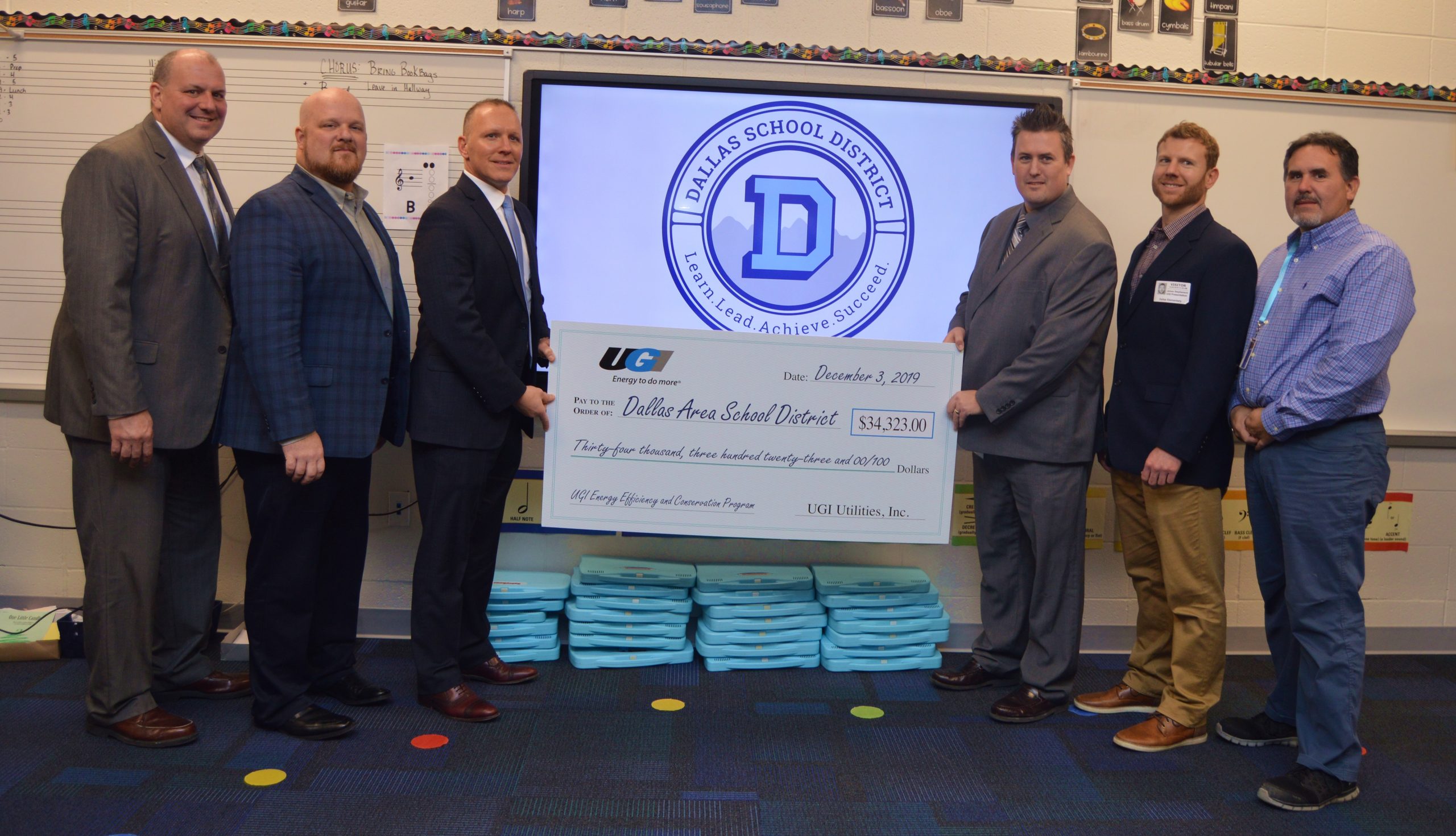 UGI presents Dallas school district with rebate check