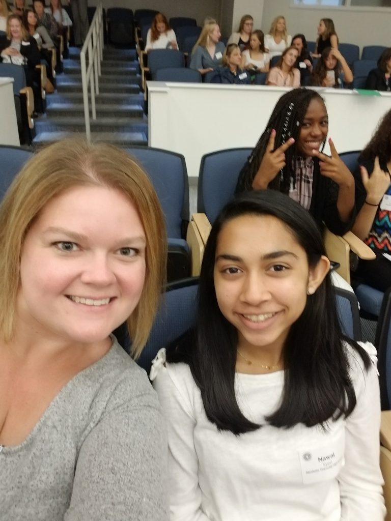 UGI's Patrice Donahue sits next to high school student at women's mentoring event