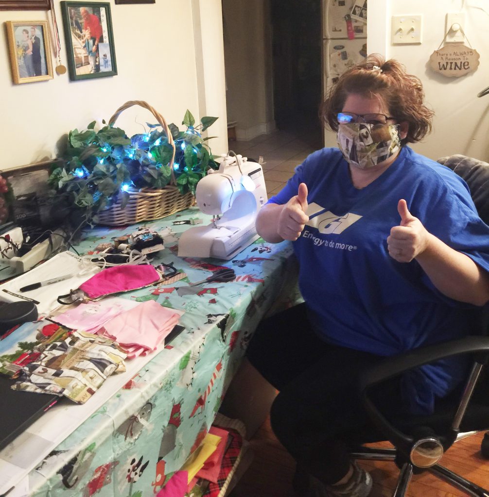 women sewing masks for healthcare workers
