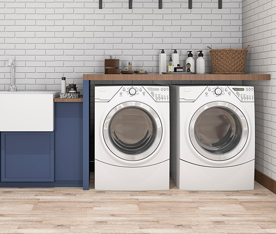 Laundry room with dryer, washer and sink