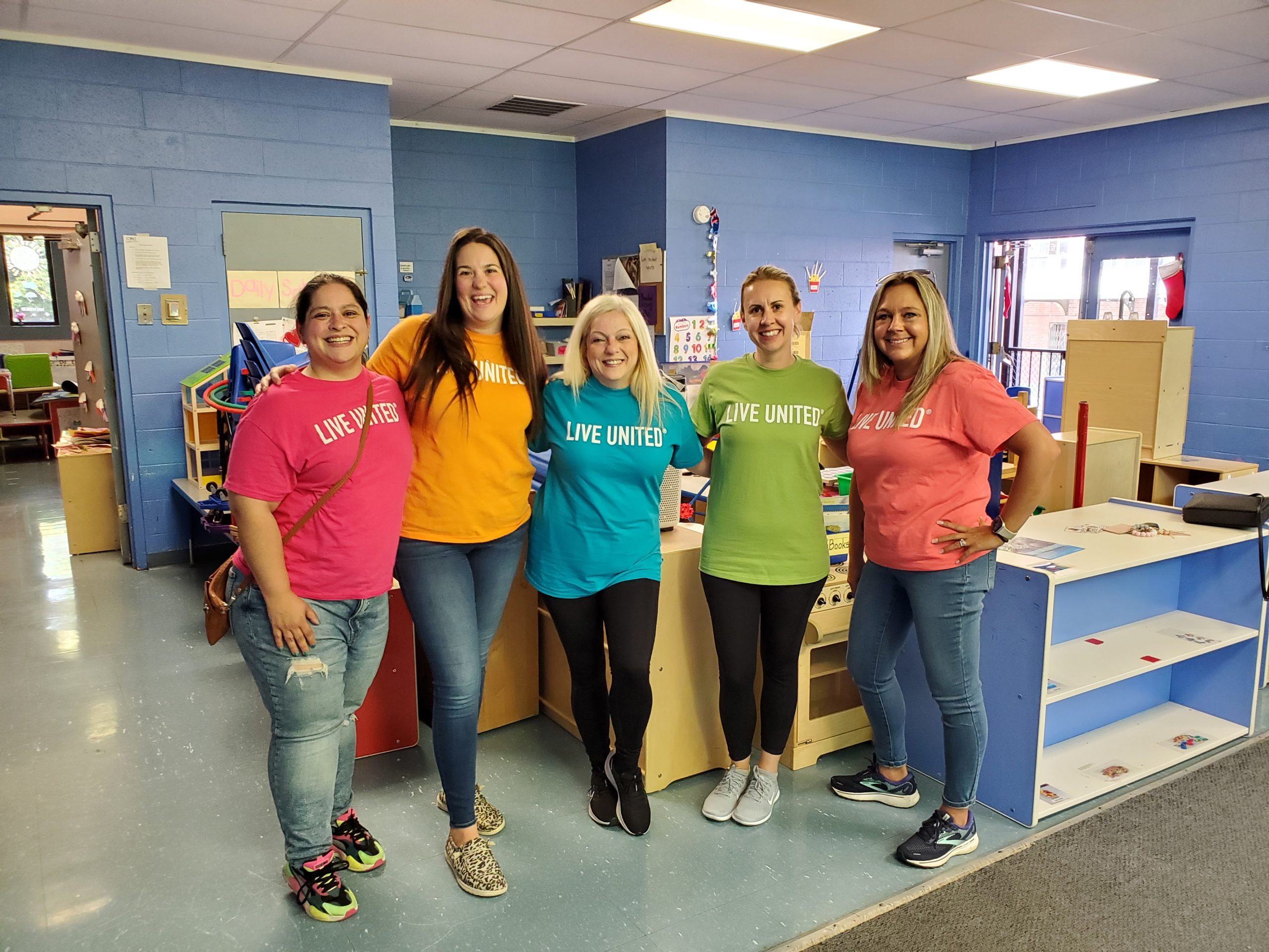 UGI employees pose in the Child Development Council Day Care.