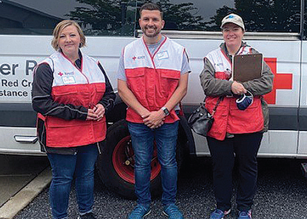 UGI employees posing for picture in American Red Cross gear