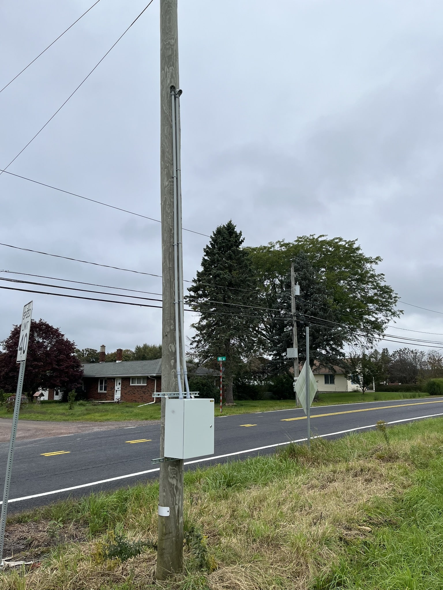 Part of UGI's lightning detection system is a grey unit on a utility pole.