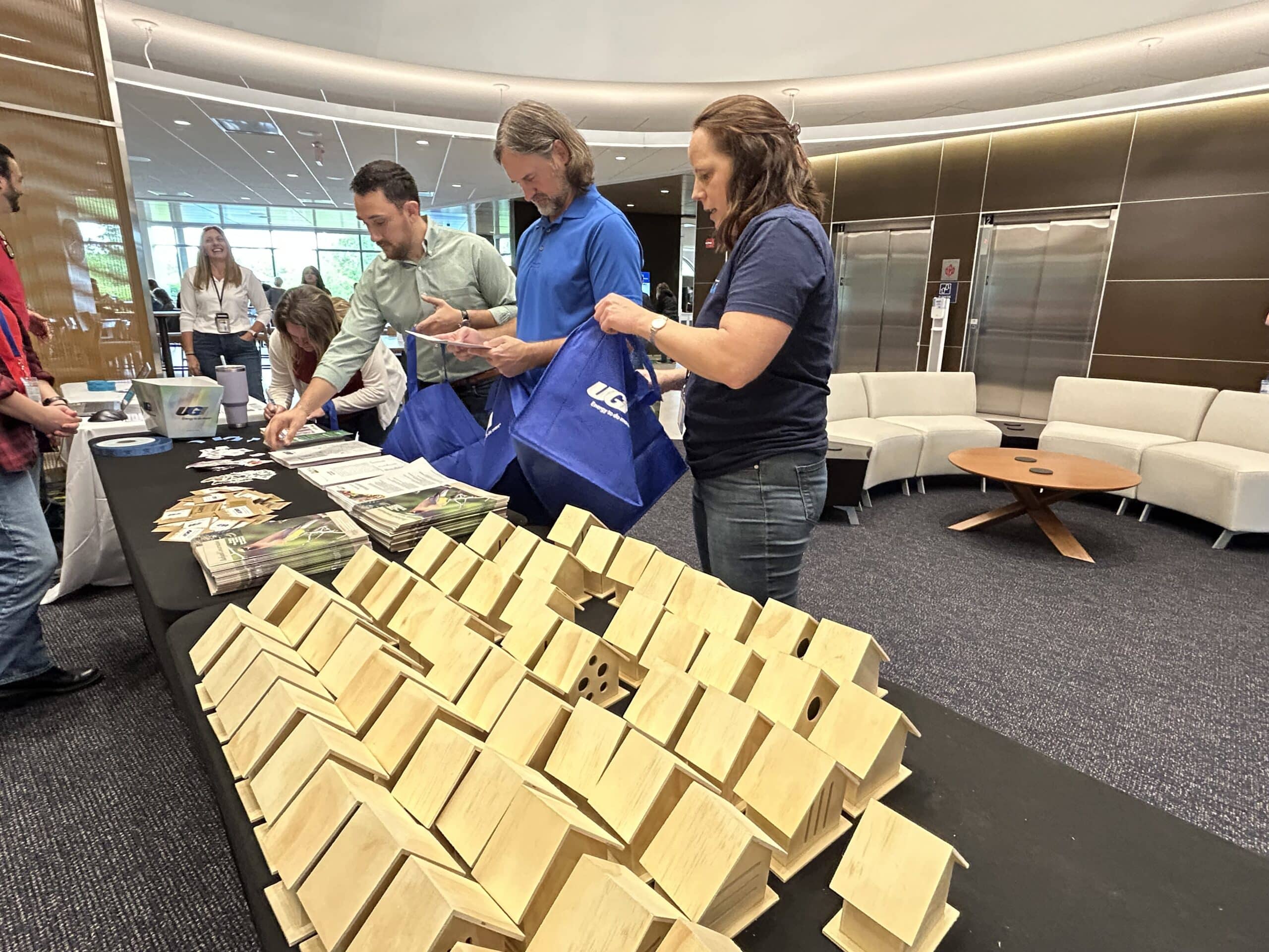 UGI employees assemble pollinator packets for local students.