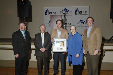 Henry Winkler standing with UGI employees.