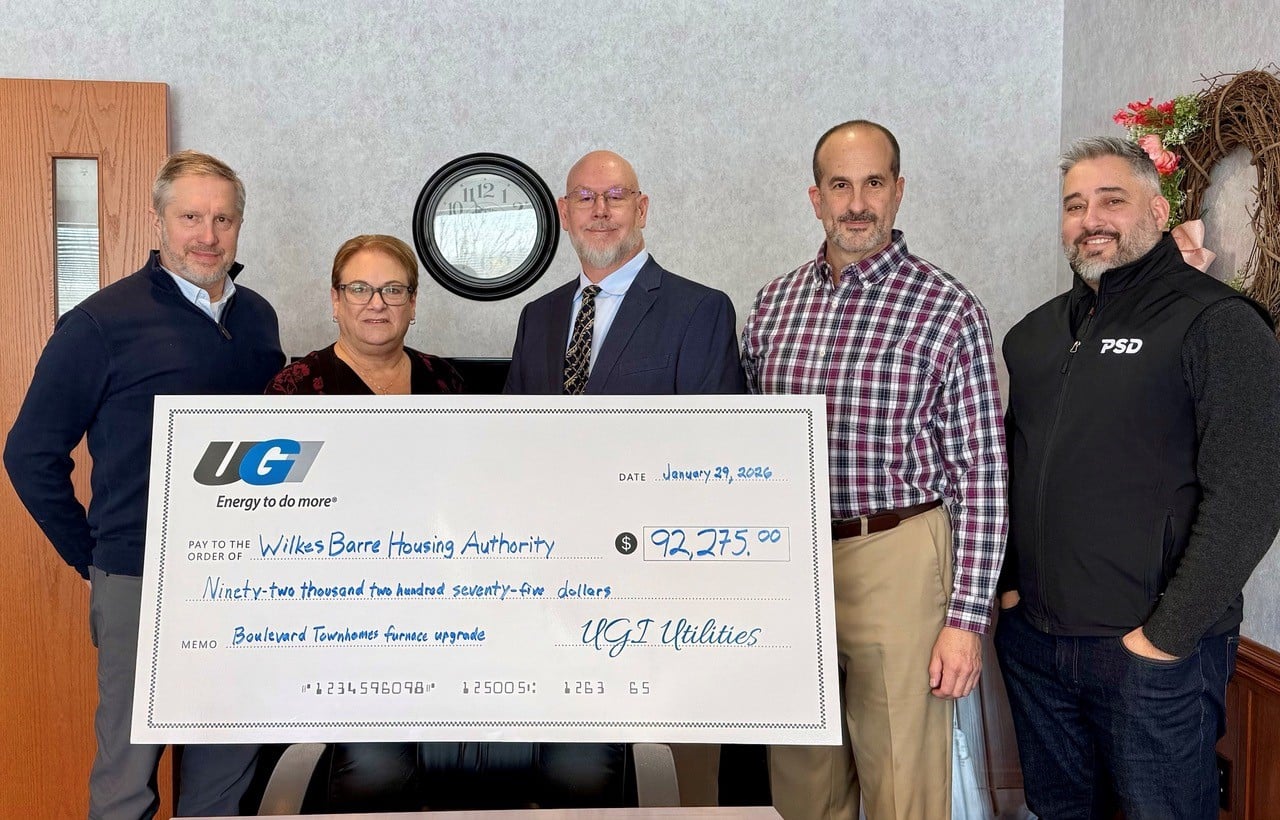 Check presentation between UGI and Wilkes Barre Housing Authority.