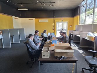 UGI employees assembling literacy kits at our Reading office.