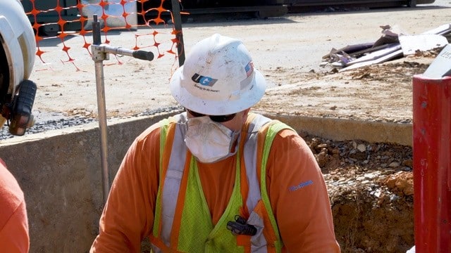 UGI employee with mask on working during the Covid pandemic.