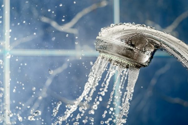 Showerhead powered by gas hot water heaters
